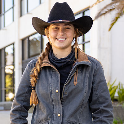 Girl wearing cowboy hat