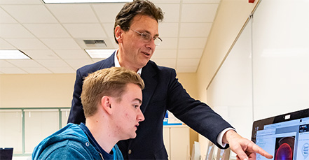 Student and teacher in class