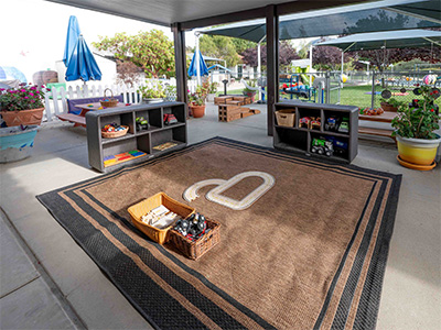 Toddler patio with car track