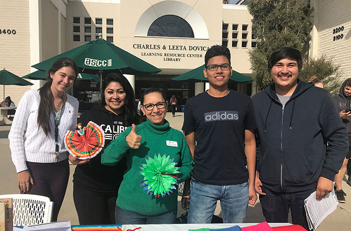 Students at Fall Fest table
